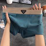 Men's Ice Silk net pattern Premium Boxer ( Set of 04 )