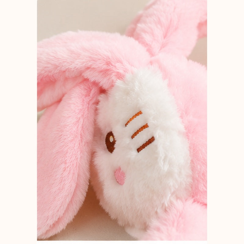 Rabbit face close up of pink fluffy ear warmer