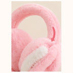 Close up of soft plush fabric of pink bunny earmuff