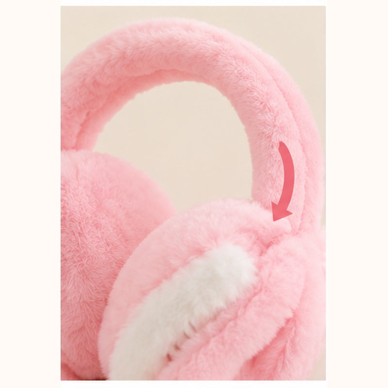 Close up of soft plush fabric of pink bunny earmuff