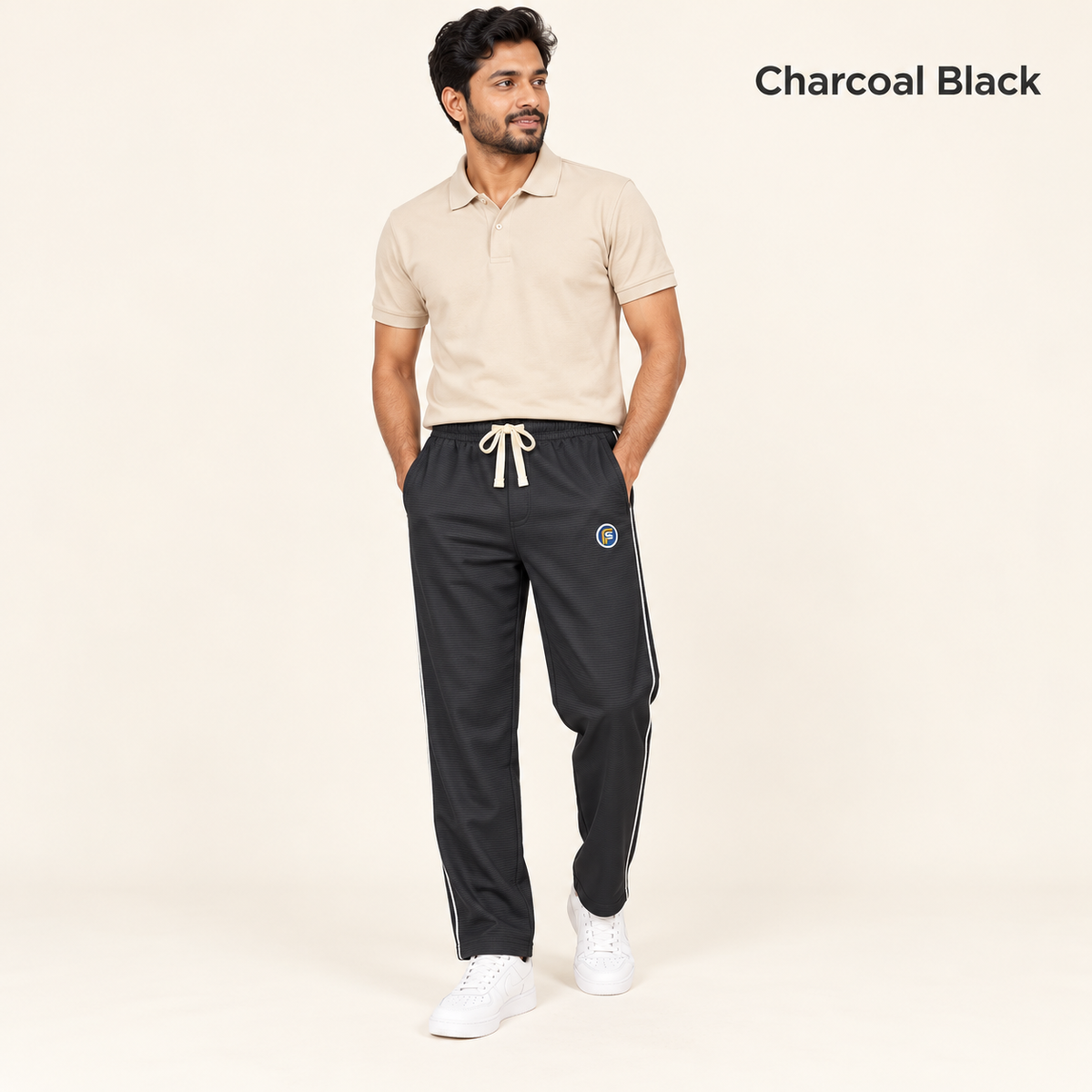Charcoal Black trousers worn by model in studio