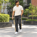 Charcoal Beige trousers worn by Bangladeshi model in courtyard